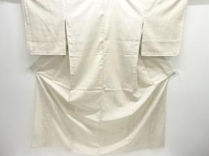 未使用品　幾何学に花模様織出し本塩沢100亀甲単衣着物